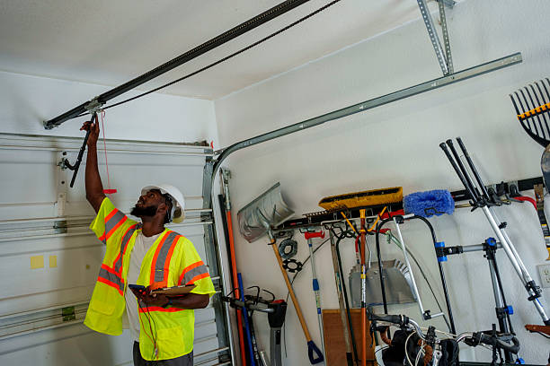 Professional Garage Door Panel Replacement technician working in Caledonia, MN